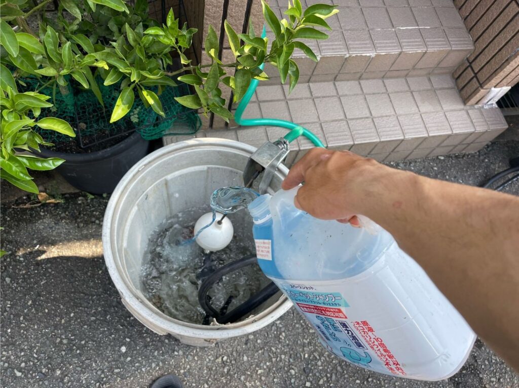 洗浄液投入